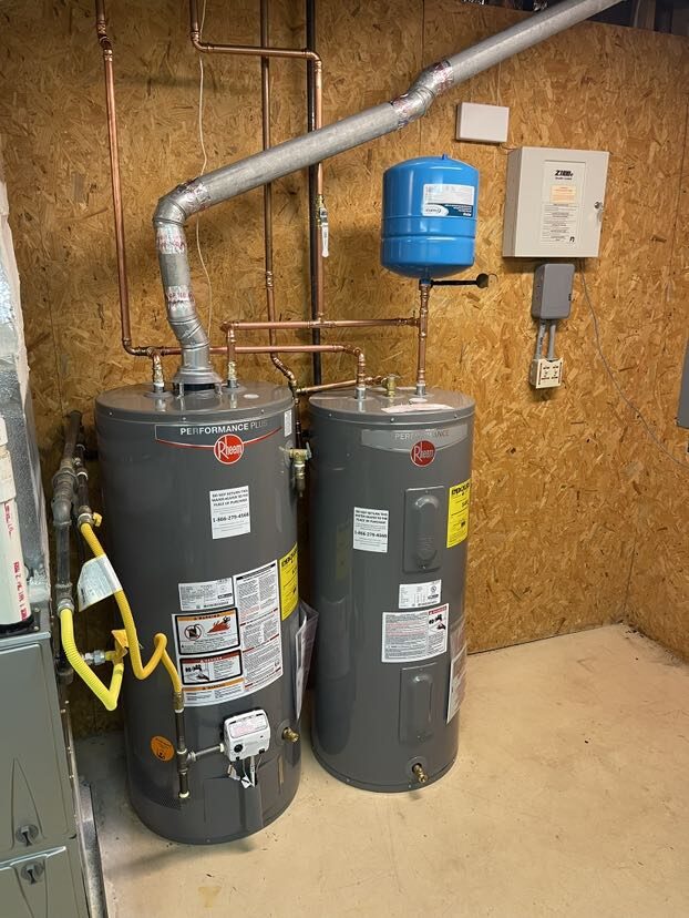 Dual Rheem gas installation with expansion tanks